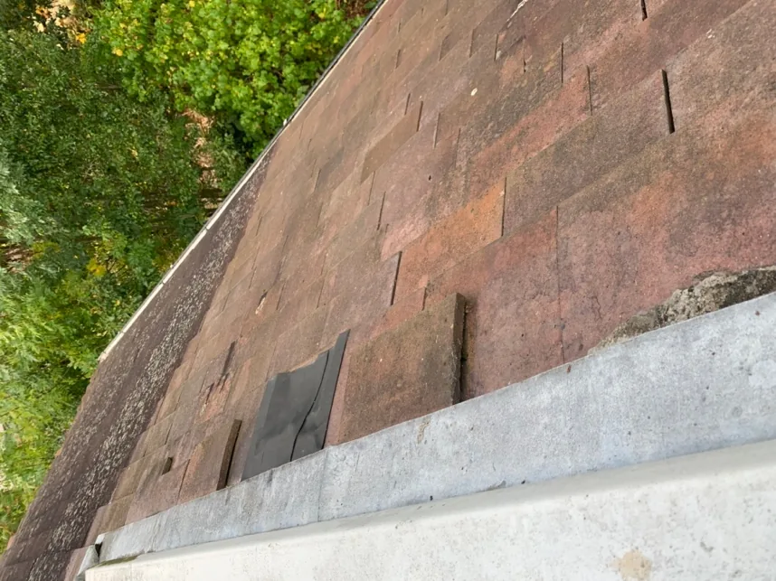 The existing handmade clay roof tiles seen close up