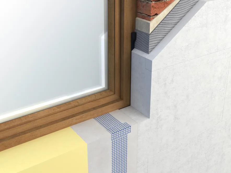 Cutaway detail of an insulated window reveal meeting the internal wall insulation
