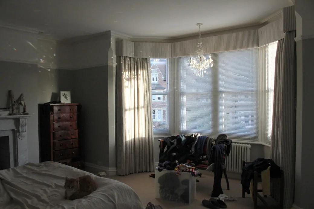 The principal bedroom bay with its run of sash windows
